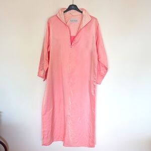 Fernando Sanchez pink nightgown.